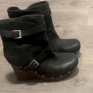 Uggs wedge clog heel worn with love leather upper wood sole. very comfortable.